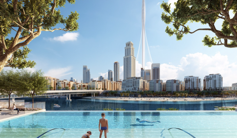 Vue 3D de la Dubaï Creek Tower avec en premier plan une piscine prolongée d'un vaste canal aux eaux turquoises